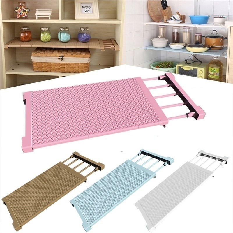 https://amzupload.s3.us-east-2.amazonaws.com/wp-content/uploads/2020/02/20032941/Retractable-Wardrobe-Closet-Storage-Rack-Nail-Free-Layered-Partition-Board-Telescopic-Shelf-Kitchen-Bathroom-Storage-Shelf.jpg